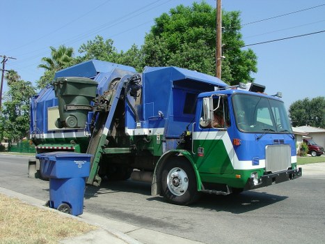 Skip hire truck parked in Chingford preparing sustainable waste collection