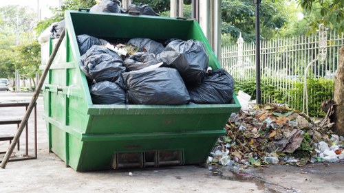 Professional team assisting with skip hire in Chingford